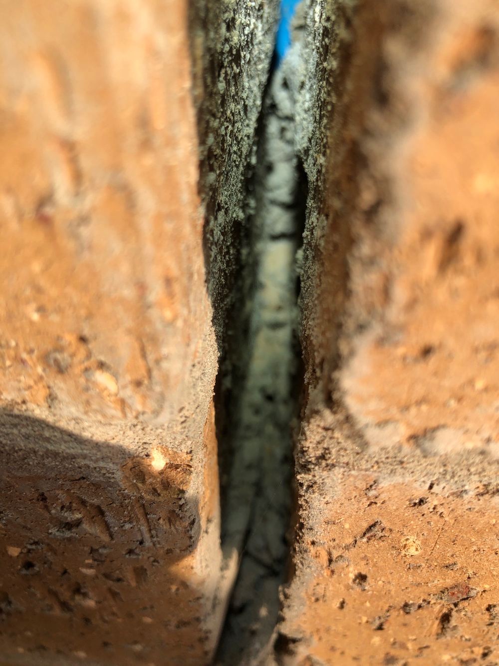 Mortar and rubbish left inside a joint that should be clear to move, Truganina