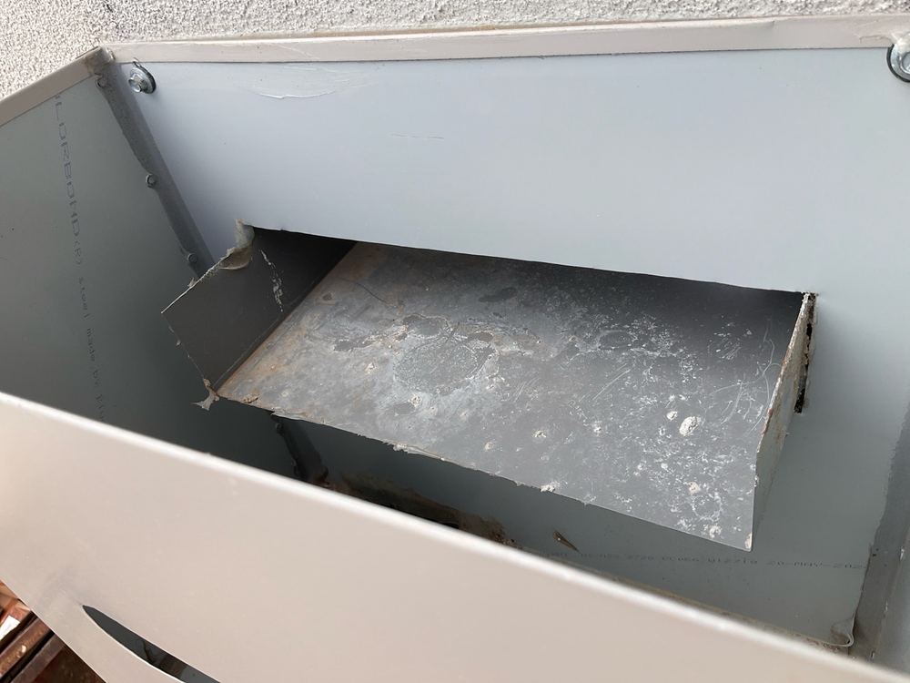 Box gutter to rainhead joint unsealed, a hidden path for water, found during a pre-handover inspection in Truganina