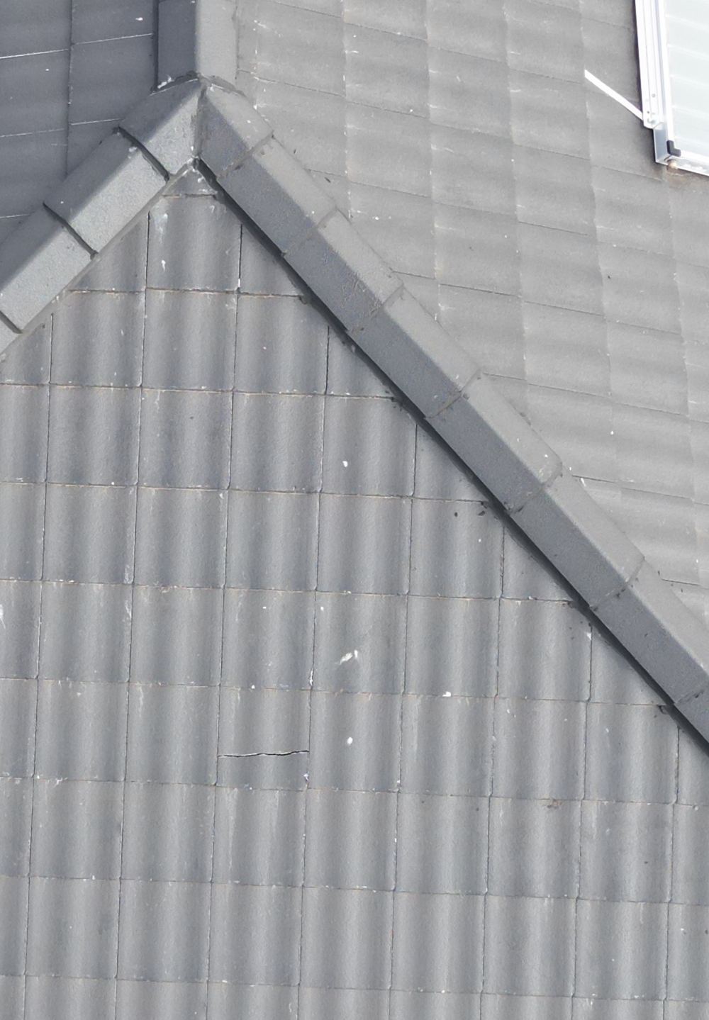 Cracked roof tiles found at handover that let water into the roof, found during a pre-handover inspection in Truganina