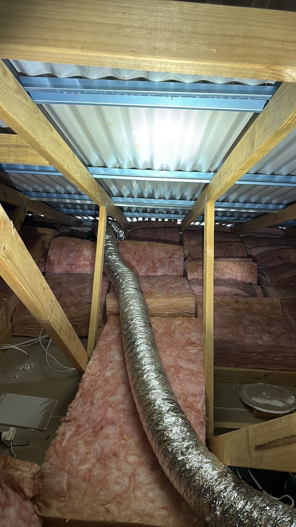 Metal roof laid without sarking underneath to manage condensation, found during a pre-handover inspection in Truganina