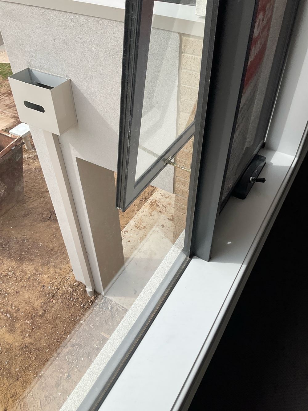 An upstairs bedroom window without its 125mm stop: a Truganina handover item