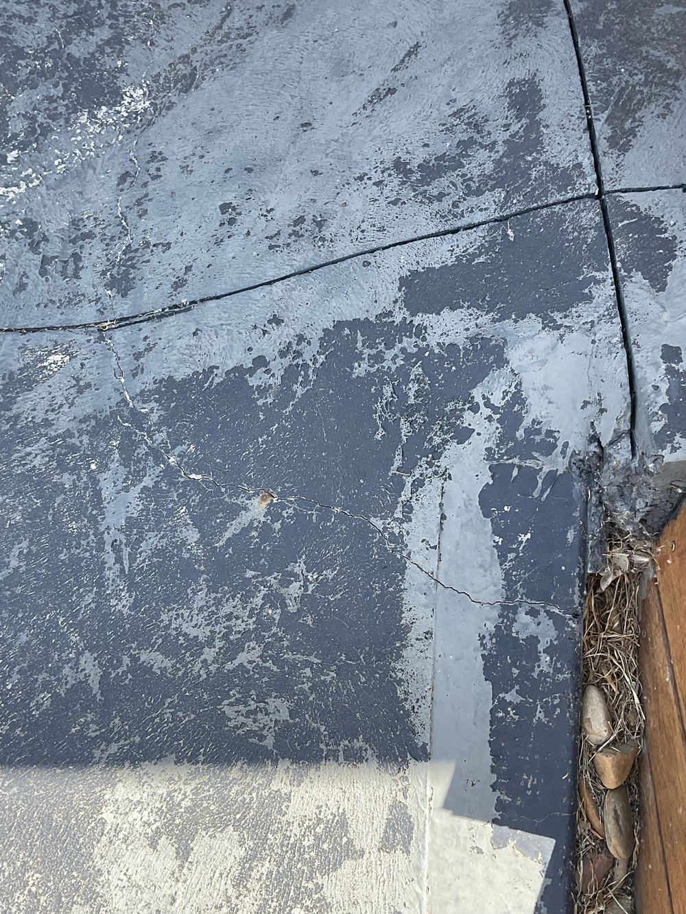 Chipped and broken concrete edge on an established home, found during a pre-purchase inspection in Truganina