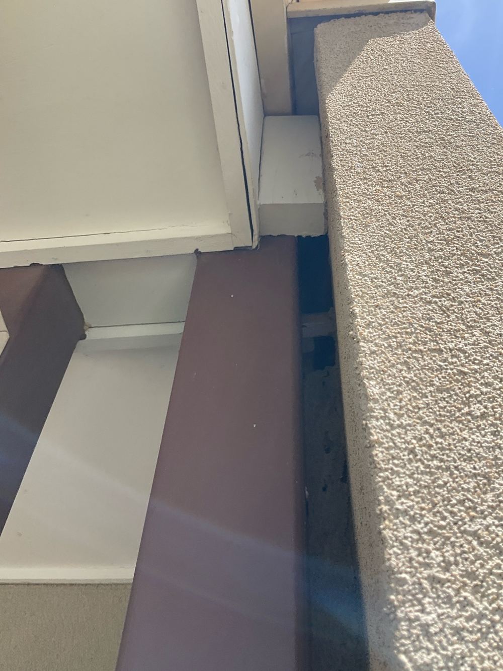 Cladding separated at a joint, exposing the frame behind to moisture, found during a pre-purchase inspection in Truganina