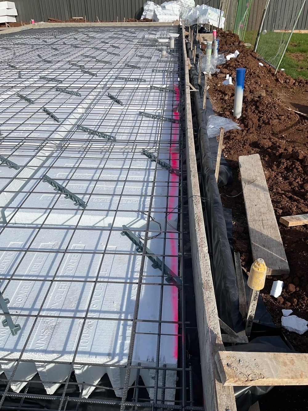 Loadbearing stem narrower than the 150mm needed to pass load down to the footings, found during a slab pre-pour inspection in Truganina